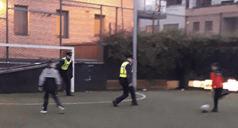 PICS: These Gardaí took a quick break to play a game of 3-a-side with locals PICS: These Gardaí took a quick break to play a game of 3-a-side with locals