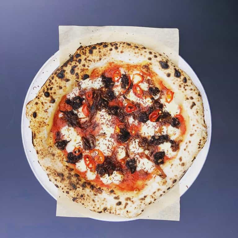 Two of our fave foods become one atop this tasty pizza Two of our fave foods become one atop this tasty pizza