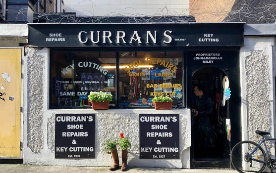 shop front of curran's shoe repair shop
