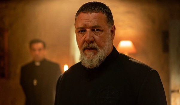 russell crowe wearing black priest-like garments